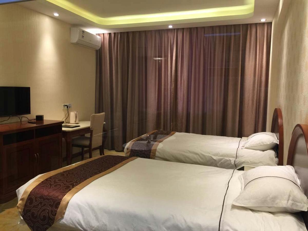 Bai Nian Sheng Shi Hotel Kunming Eksteriør billede